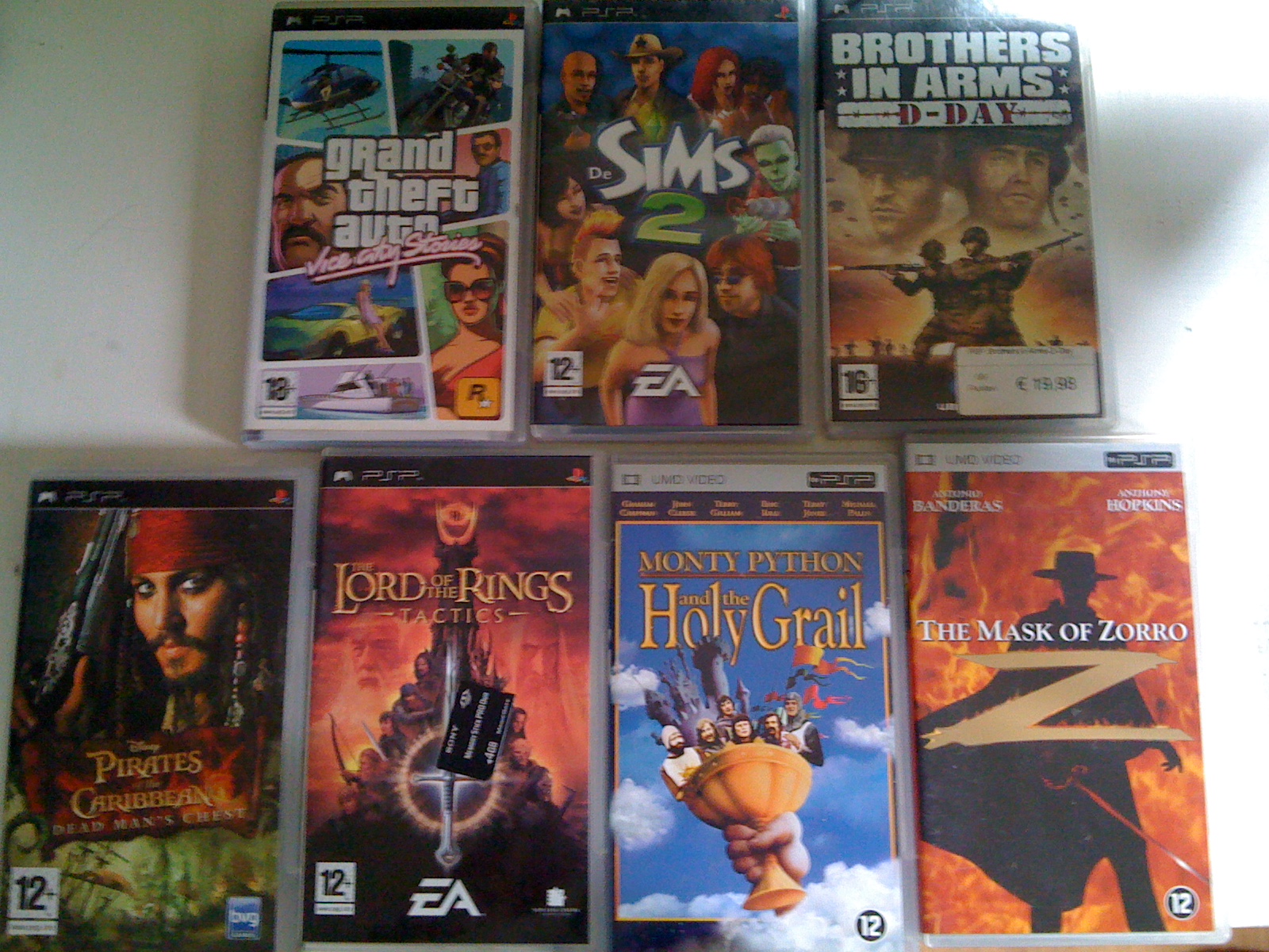 Omgebouwde PSP + hoes + houder + 4GB Mem + 5 games + 2 Films-img_0035-jpg